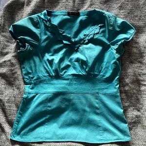 The limited teal women’s dress top